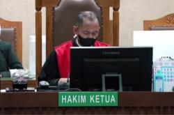 PN Jakpus Jawab Protes Kubu Hasto: Hakim Rios Pakai Masker sejak Pandemi Covid-19