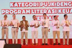 Penghargaan OJK atas Komitmen Literasi Keuangan