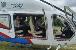 Naik Helikopter, Kapolda Sulut Pantau Manado dan Bitung dari Udara selama Nataru