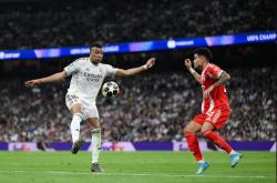 Hasil Lengkap Liga Champions: Real Madrid Dibungkam Bayern Munchen, Arsenal Menang Tipis