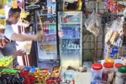 Ngeri! Preman di Medan Siram Bensin dan Ancam Bakar Warung gegara Tak Diberi Uang<