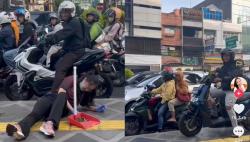 Viral Seorang Wanita Nekat Rebahan di Trotoar Halangi Pemotor Terobos Jalur Pejalan Kaki