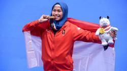 Senyum Taekwondoin Defia Rosmaniar, Sumbang Emas Pertama untuk Indonesia