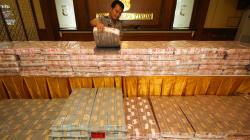 Deretan Barang Bukti Uang dan Mobil Kasus Investasi Bodong MeMiles