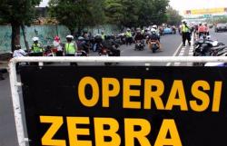 Gelar Operasi Zebra, Puluhan Polisi dan Anggota TNI Sosialisasi di Jalan Trans Sulawesi