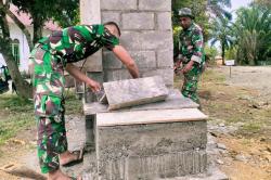 Satgas Kodim Nagan Raya Bangun Tugu TMMD ke 133