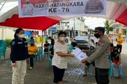 Gelar Vaksinasi Massal, Gerai Polres Tomohon di Pusat Kota Diserbu Warga