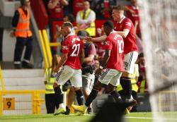 Brace Marcus Rashford Bawa Reds Devils Sikat The Gunners