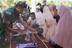 Warnai HUT Kodam, Korem 011/LW Adakan Baksos Pengobatan Gratis dan Penyuluhan Stunting