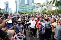 Gowes dari Istana Merdeka, Presiden Joko Widodo Berbaur Bareng Warga Jakarta di CFD Thamrin