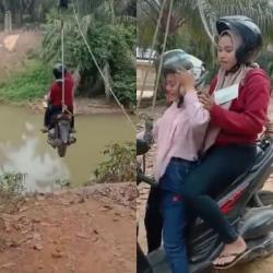 Ekstrim! 2 Gadis Berhijab Nekad Sebrangi Sungai Pakai Seutas Tali, Warganet Singgung Uang Pajak