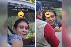 Gaya Santai Susi Pudjiastuti Minta Rokok di Kemacetan Arus Mudik Lebaran