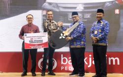 Bank Jatim Serahkan CSR dan Launching Elektronifikasi Keuangan Daerah di  Probolinggo