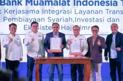 Optimalkan Potensi Bisnis, Pos Indonesia dan Bank Muamalat Teken Kerja Sama Strategis