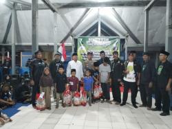Malam Pergantian Tahun, Kapolsek Malingping Bersama TTKKBI Lakukan Aksi Berbagi