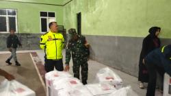 Polisi Lakukan Pengamanan Datangnya Logistik Pemilu 2024 di Cisurupan Garut