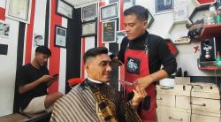 150 Warga Pasuruan Gembira, Usai Coblosan Langsung Potong Rambut Gratis