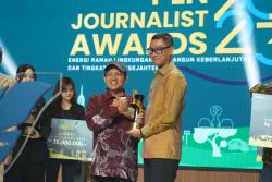 Wartawan Okezone Taufik Budi Juara dalam PLN Journalist Awards 2023