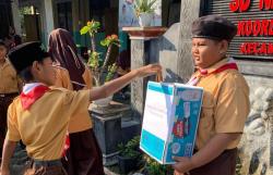 Pramuka SDN 3 Genengsari Kemusu Galang Donasi Untuk Anak Yatim Piatu