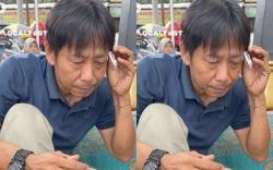 Netizen Soroti Pria Mirip Shin Tae-yong Lagi Santai Lesehan Minum Es Kelapa di Pinggir Jalan