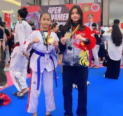 Dua Putri Anggota Korem 131/Santiago Raih Medali Emas Kejuaraan Taekwondo