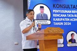 Kadis PUPR Aceh Barat, Dr.Kurdi Jadi Penguji Rancangan Proyek LAN RI