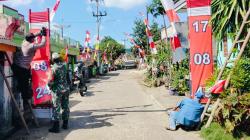 Sambut HUT ke-79 RI, TNI-Polri dan Warga di Cipatujah Tasikmalaya Gotong Royong Bangun Gapura