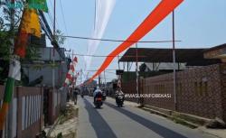 Keren! Warga RW 02 Mustikajaya Bekasi Bentangkan Bendera Merah Putih Sepanjang 750 Meter