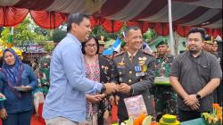 HUT TNI, BRI Rantauprapat Berikan Tumpeng ke Dandim 0209/LB