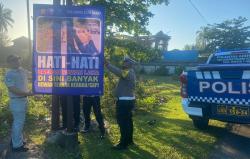 Sat Lantas Polres Aceh Barat bersama Jasa Raharja Pasang Spanduk Himbauan Tertib Berlalu Lintas