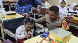 Polres Ciamis Salurkan Bantuan Gizi dan Kursi Roda untuk Siswa SLB Negeri Sindangsari