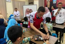 ACI Ojek Online Dukung Program Makan Bergizi Gratis, Salurkan Bantuan ke SLB di Surabaya