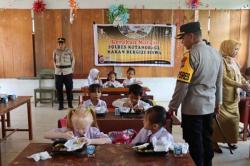 Polres Kotamobagu Gelar Pembagian Sarapan Sehat untuk Siswa SD Negeri 3 Pangian