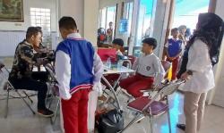 Ratusan Yatim Piatu dan Difabel Semringah dapat Baju Seragam Baru di Awal Tahun