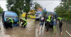 Polisi Penolong, Bripda Aco dan Bripda Jamal Bantu Lansia yang Mobilnya Mogok akibat Genangan Air