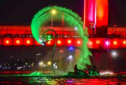 Potret Atraksi Flyboard Body Lighting di Sungai Musi Palembang