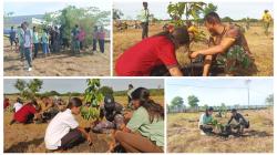 Satgas TMMD Bersama Warga Peghijauan di Lahan Puskesmas Mangili Guna Mendukung Lingkungan Lestari