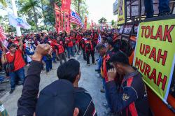 Potret Aksi Hari Buruh Internasional di Palembang