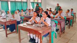 Kodim Tapanuli Utara Dampingi Program Makan Bergizi Gratis di Balige dan Tarutung