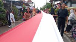 Warga Kranggan Klaten Arak Bendera Merah Putih Sepanjang 1.000 Meter di Hari Kebangkitan Nasional