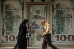 Era Baru Dedolarisasi, Emas Geser Dolar AS Keluar dari Sistem Keuangan Global