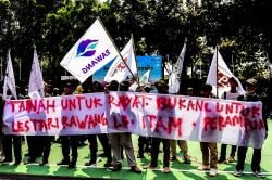 Potret Aksi Warga Tolak Pengambilan Wilayah Kelola Masyarakat 