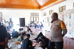 Kapolres Jayapura Tinjau Langsung Proses Pelipatan Surat Suara PSU