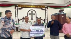 Dukung Entas Kemiskinan, BPJS Ketenagakerjaan Humbahas Serahkan JKM ke Ahli Waris Jemaat GKLI