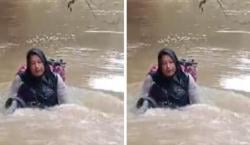 Viral, Bidan Nekat Seberangi Sungai karena Jembatan Putus demi Bantu Pasien sambil Gendong Obat