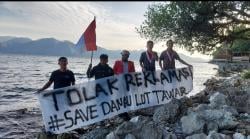 Sambut Kemerdekaan, Aktivis GMNI Kibarkan Merah Putih di Danau Laut Tawar, Protes Diamnya Bupati