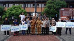 Enam Ahli Waris di Garut Terima Santunan BPJS Ketenagakerjaan dari DBHCHT