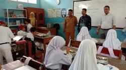Peluncuran Perdana Program Makanan Bergizi Gratis Disambut Antusias Siswa di Tenjolaya Bogor