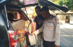 Semua Kendaraan Diperiksa! Polsek Batu Putih Sita Puluhan Liter Sopi di Jalur Trans Timor