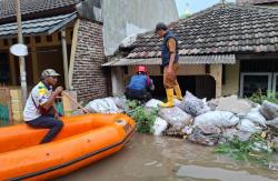 Hadapi Cuaca Ekstrem Warga Kota Tangerang Diimbau Jaga Lingkungan, Pastikan Drainase Bebas Sampah